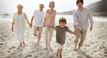 Family-Running-on-Beach